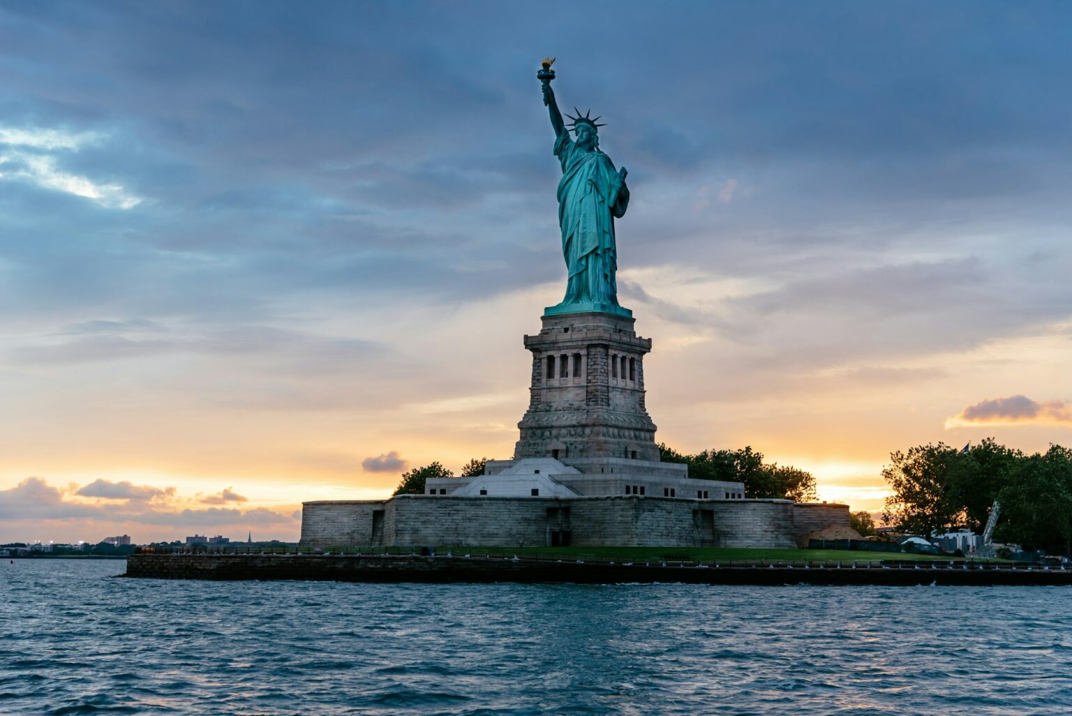 Statue of Liberty National Monument at sunset. New York City