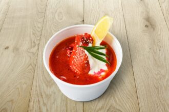 Food take away, russian soup borsch on wood