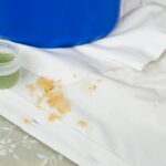 White shirt with curry gravy stain and concentrated liquid detergent